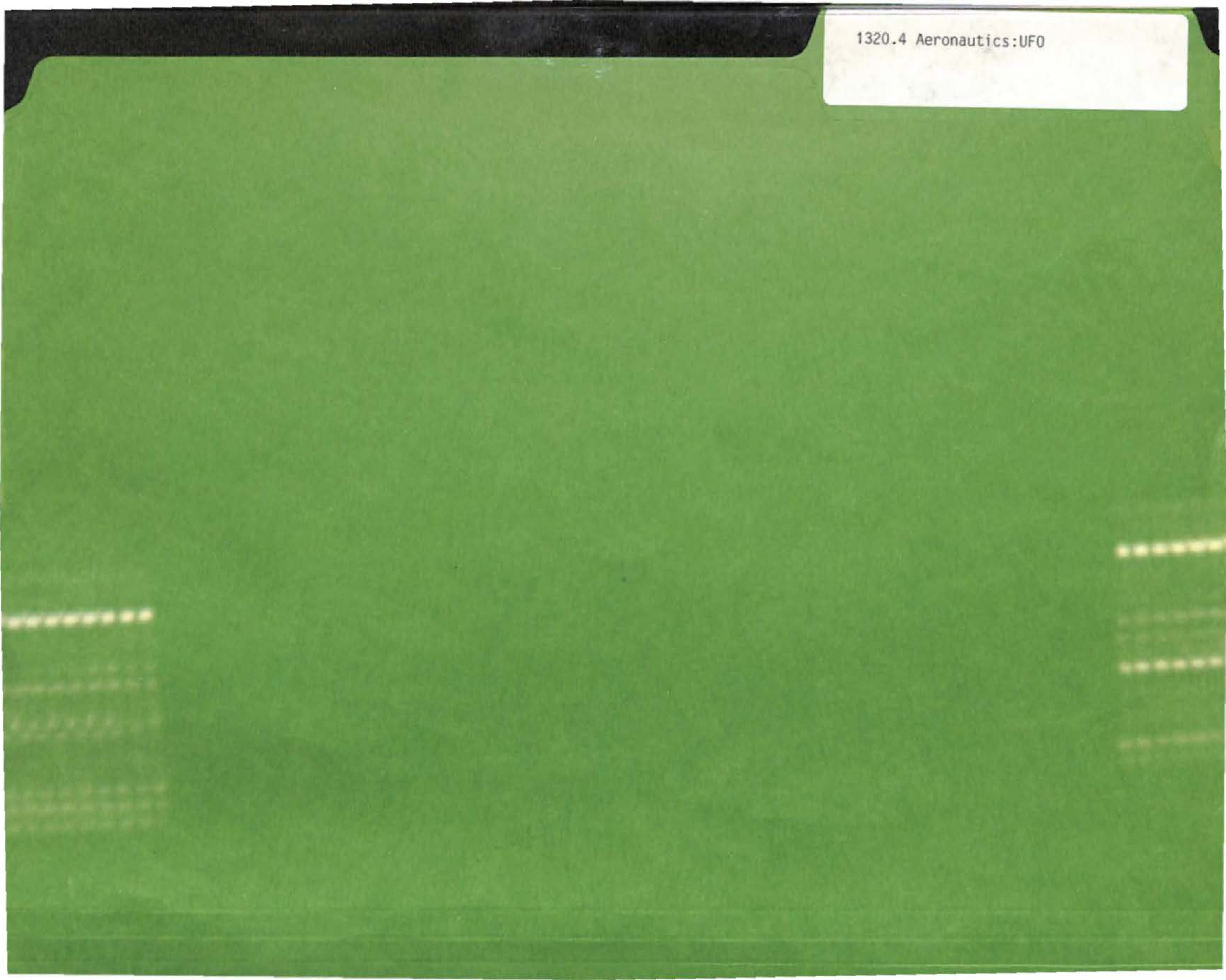 A green file folder with a white label.