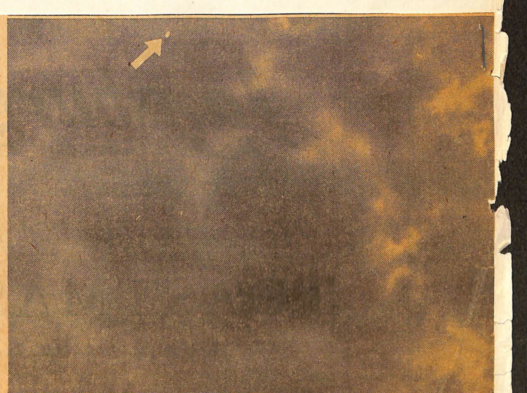 I.N.P. Photo by U.S. Coast Guard
Is It Saucer, Sorcery, or Just Plain Sausage?
Reports of "flying saucers" were laughed off by authorities until many witnesses, including reliable pilots and servicemen, said they had seen the plate-like objects whizzing overhead. Above is the picture Yeoman Frank Ryman, 27, took in the Seattle twilight when he observed what seemed to him to be a flying saucer 10,000 feet high traveling at 500 miles per hour.