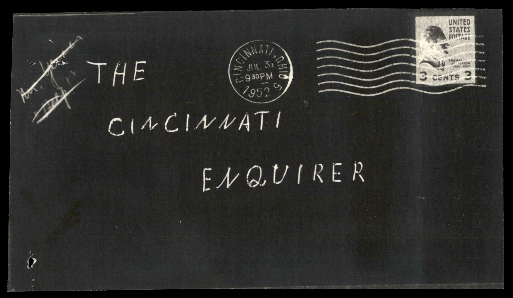 Photograph of envelope addressed to The Cincinnati Enquirer with postmark and 3-cent stamp