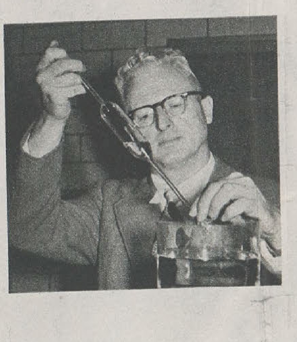 Man holding what appears to be a model or device