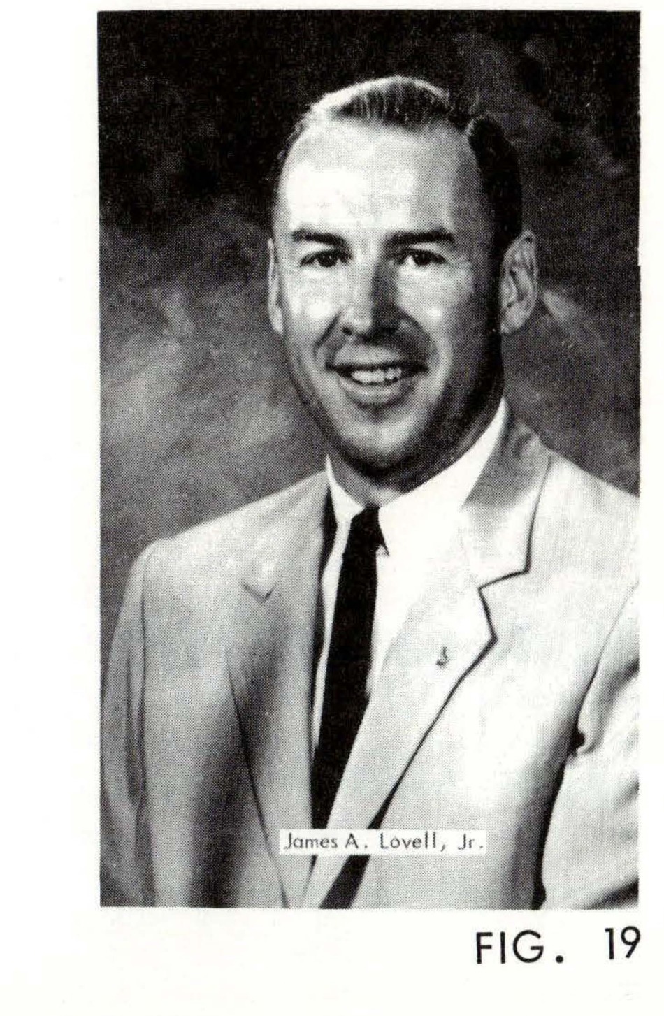 FIG. 19 - Portrait photograph of James A. Lovell, Jr.