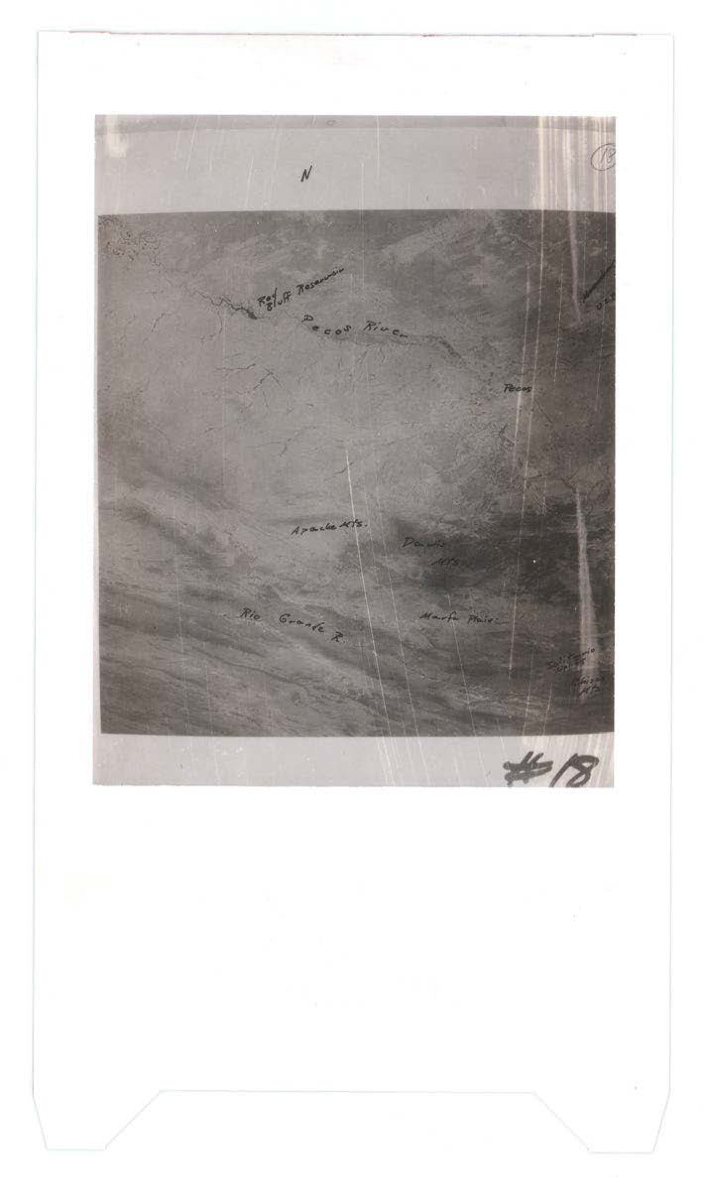 Aerial or topographic photograph with handwritten annotations indicating Old Road, Pecos River, Apache Mts., Mt. Granite, and Maria Mts., marked as #18