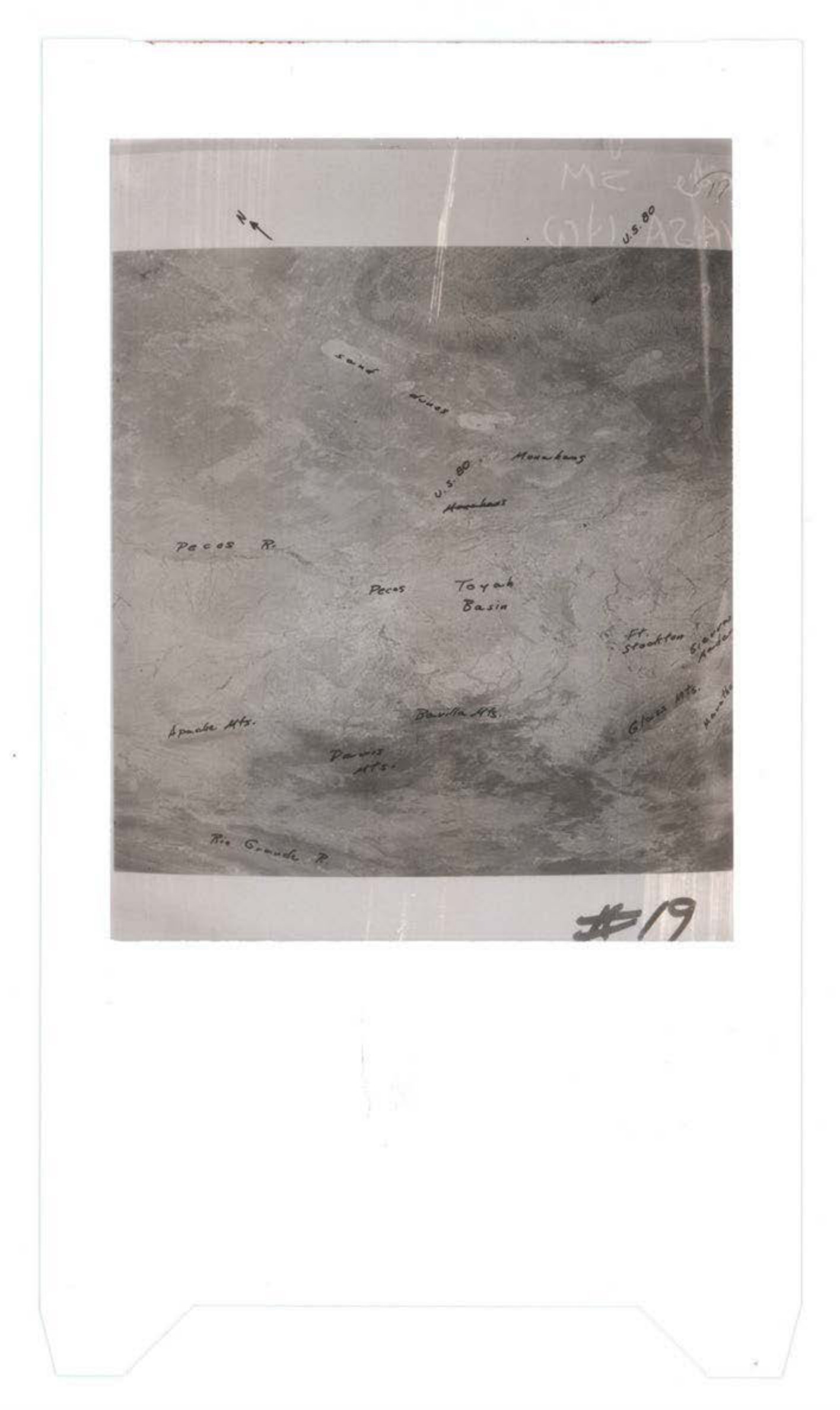 Aerial or topographic photograph with handwritten annotations marking locations including Teyuk Basin, Apache Mts., and various other geographic features