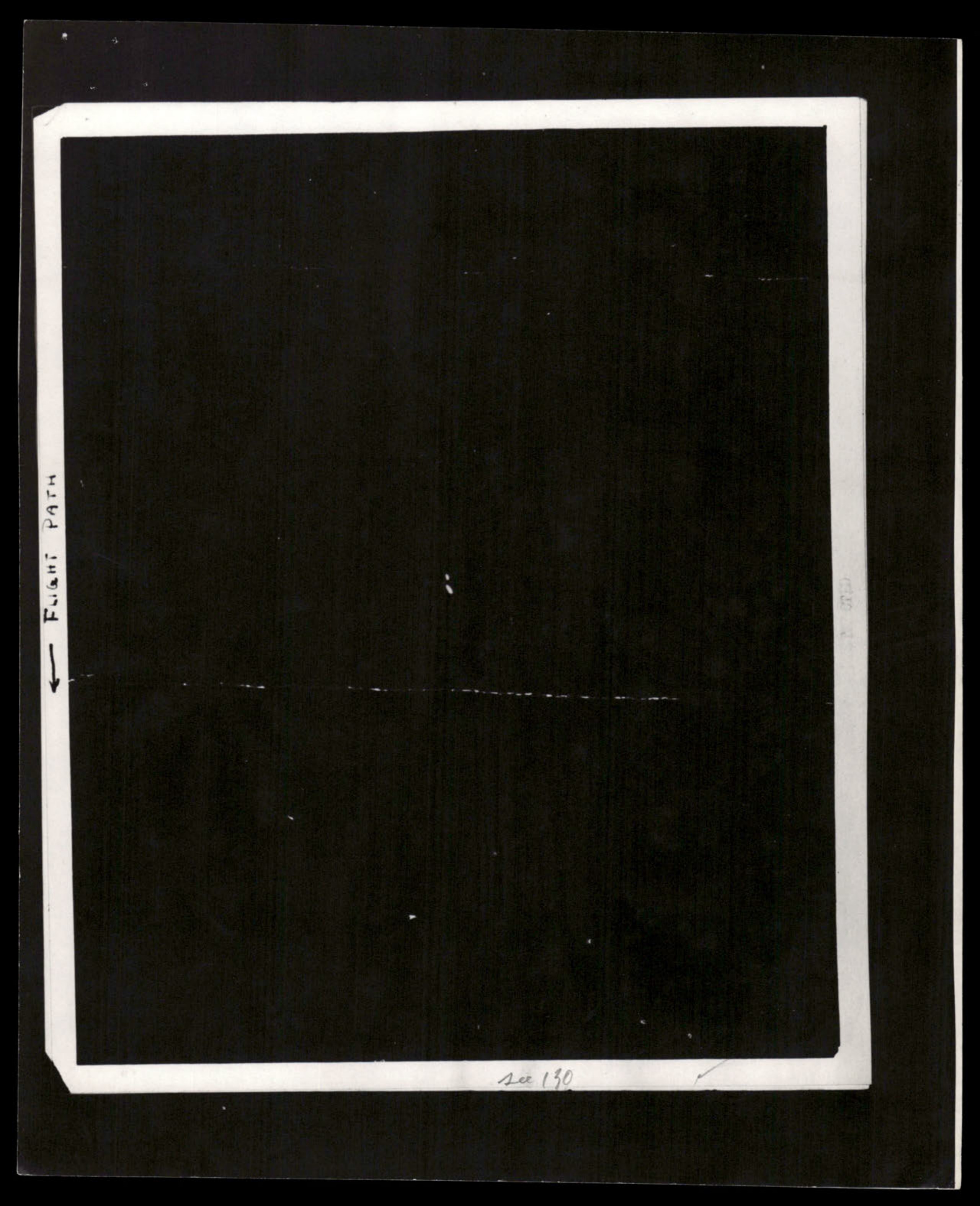A black square with a white border, possibly a placeholder or negative.