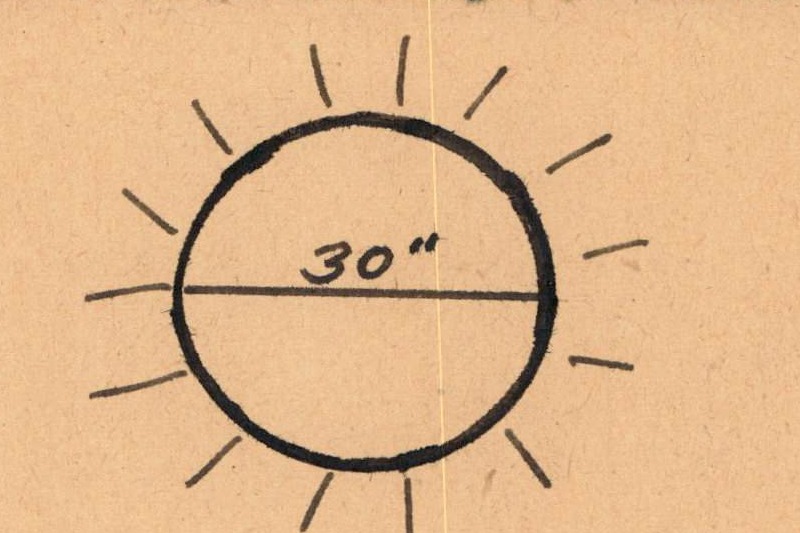 Sketch of a round light with rays emanating, labeled '30"'.