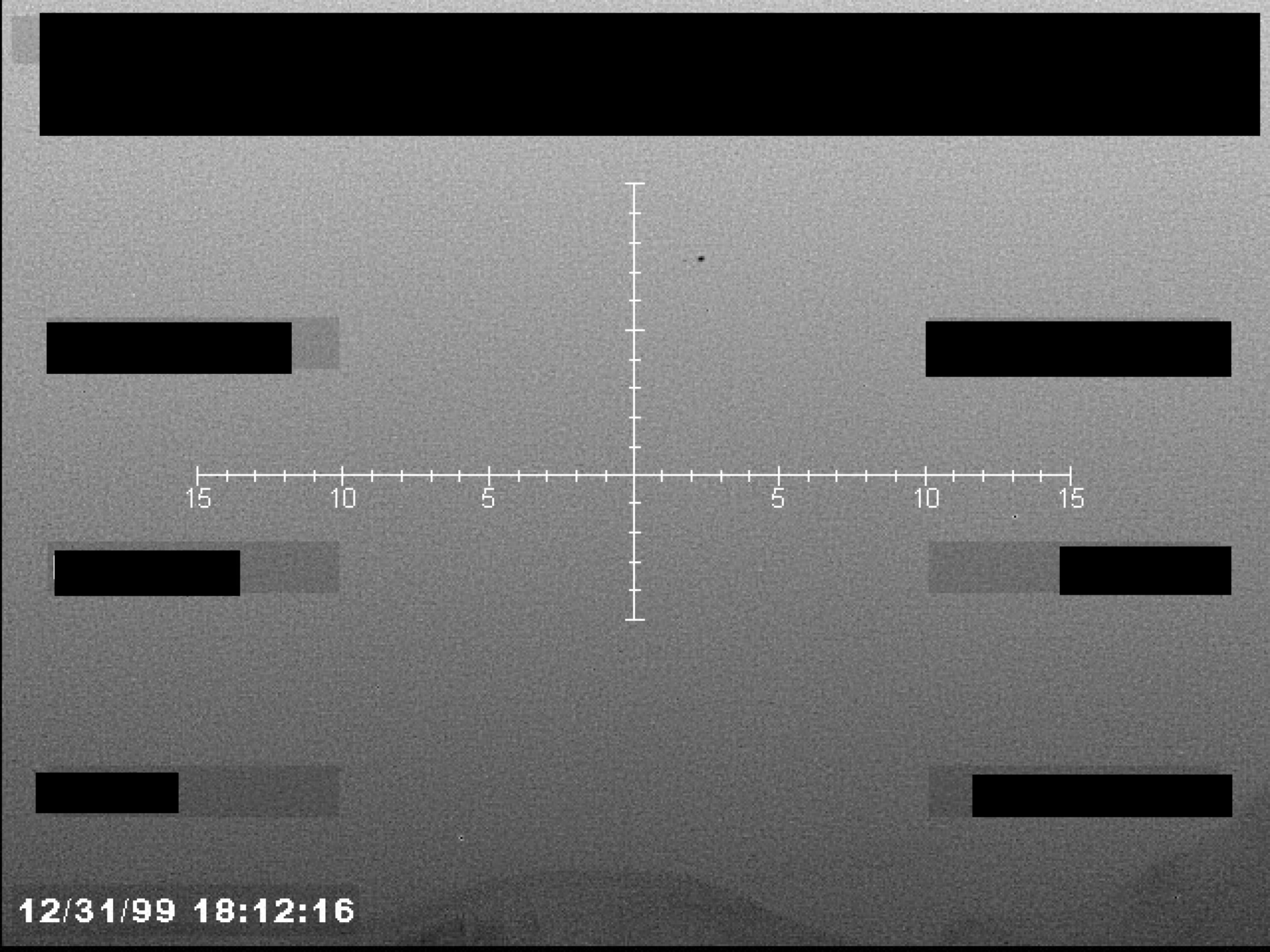 Page is a single frame from a sensor video, possibly Forward-Looking Infrared (FLIR), showing a targeting crosshair and timestamp. Several data fields are redacted with black boxes.